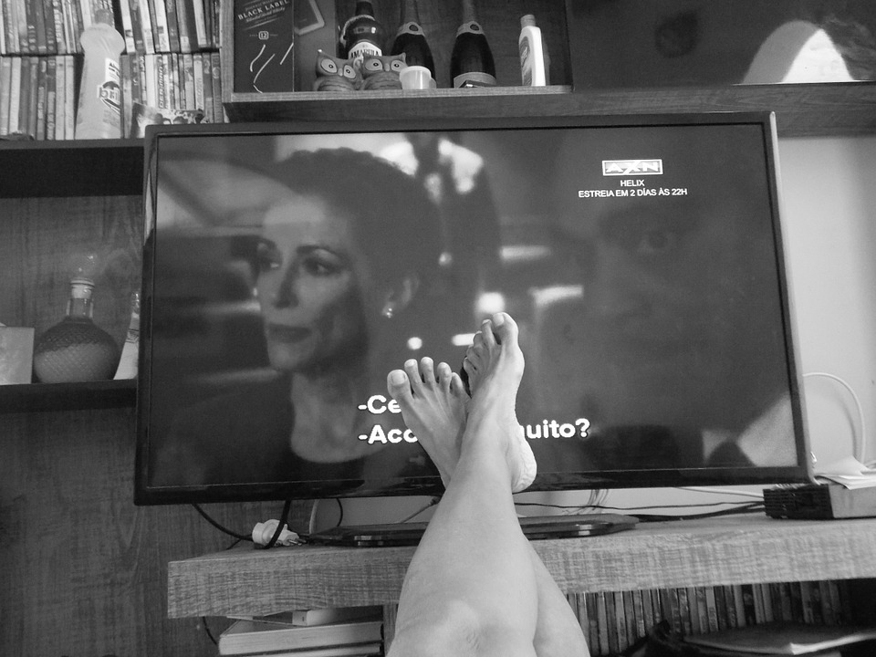 watching TV with the feet next to it